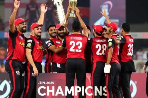 RCB Team celebrating after a thrilling win in IPL 2025